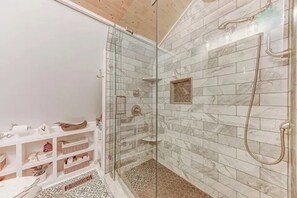 Shower, hair dryer, towels, soap