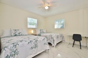 4 bedrooms, desk, iron/ironing board, travel cot