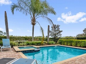A heated pool - EV_501  - 6 Bed 5 Bath Villa with Screened-In Private Pool with Spillover Spa (Kissimmee)