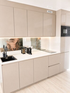 Fridge, microwave, dishwasher, coffee/tea maker