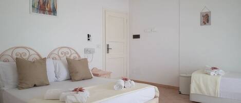 Standard Triple Room | Minibar, in-room safe, free WiFi, bed sheets