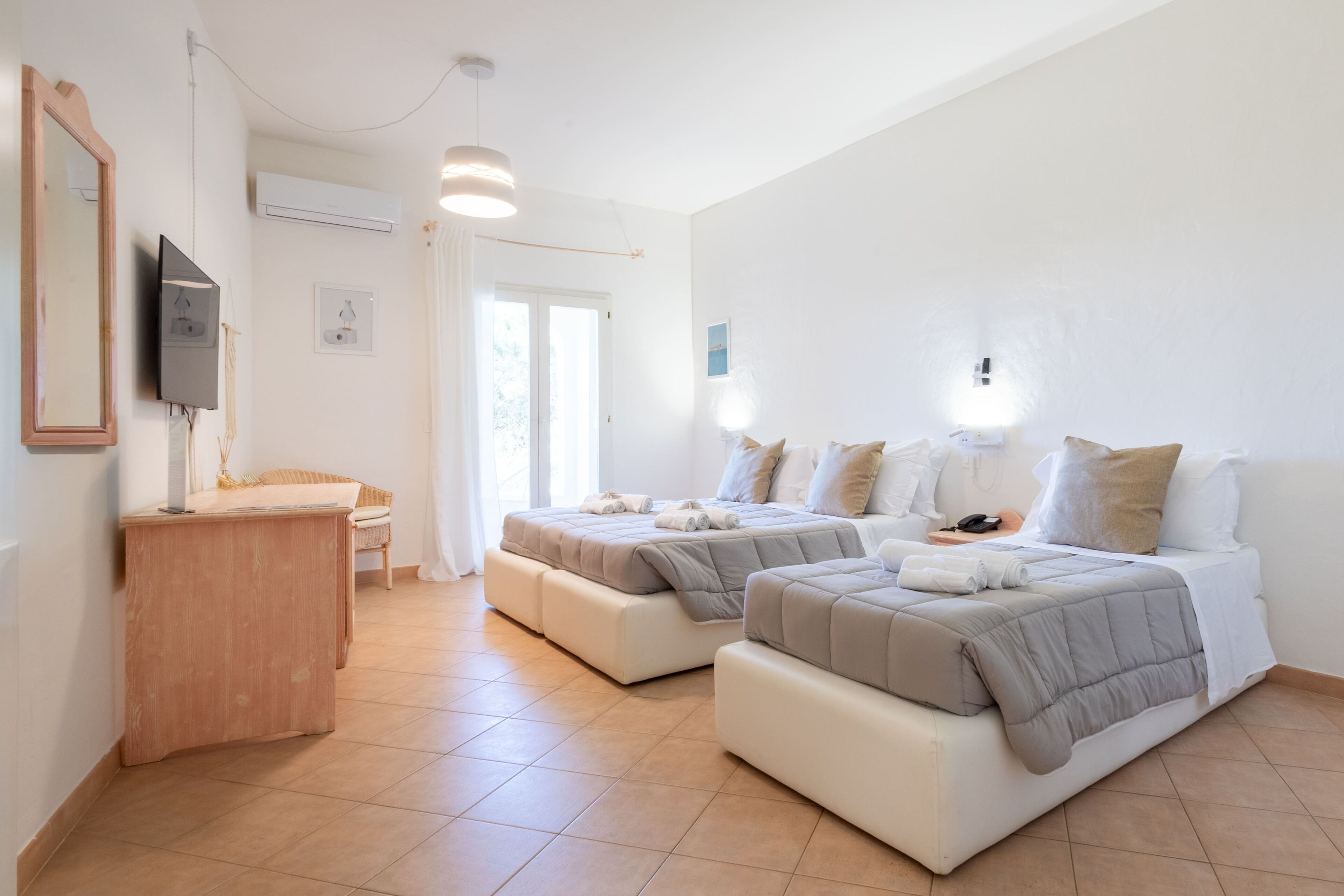 Standard Triple Room | Minibar, in-room safe, free WiFi, bed sheets