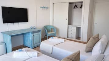 Superior kamer, 1 twee- of 2 eenpersoonsbedden, uitzicht op zee | Een minibar, een kluis op de kamer, gratis wifi, beddengoed