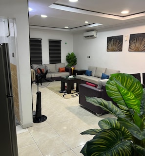 Apartment, 4 Bedrooms | Living area | 50-inch Smart TV with digital channels, Netflix, Hulu - RBZ Apartments (Lagos)
