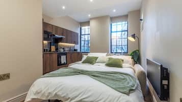 Superior Studio | Living area | Flat-screen TV