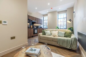 Superior Studio | Living area | Flat-screen TV