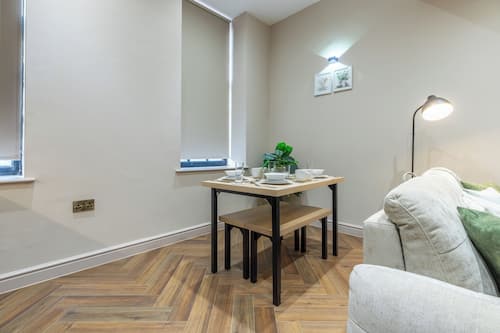 Superior Studio | Living area | Flat-screen TV