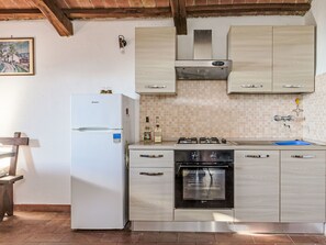 Fridge, oven, cookware/dishes/utensils