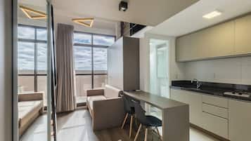 Basic Apartment | Living area | 32-inch Smart TV with digital channels