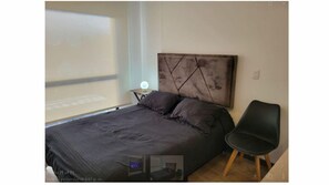 1 habitación, tabla de planchar con plancha, internet y ropa de cama 