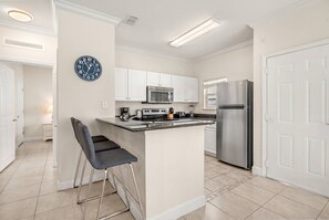 Fridge, microwave, oven, stovetop - 4BR Townhome Near Disney at Lucaya Village (Kissimmee)