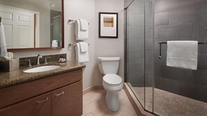 Jetted tub, hair dryer, towels, soap