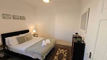 Iron/ironing board, travel crib, free WiFi, bed sheets