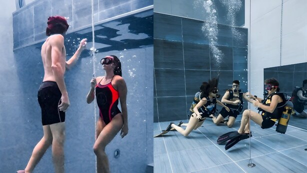 An indoor swimming pool with clear water, a diving board, and a tiled floor. - Detached house with private parking 250 meters from the spa train station (Montegrotto Terme)