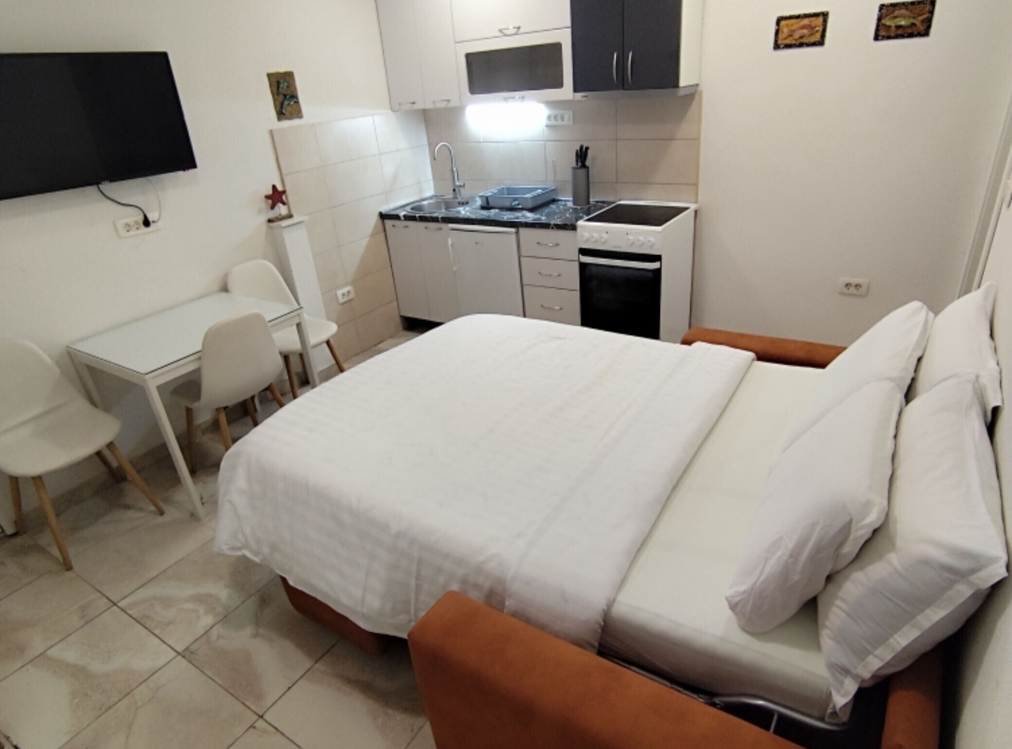 Tabla de planchar con plancha, Internet, ropa de cama