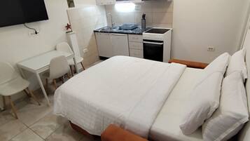 Tabla de planchar con plancha, Internet, ropa de cama