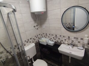 Dutxa, assecador de cabells i tovalloles