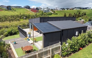 Exterior - Modern Family-Friendly Sunny Raglan Bach with Spa Pool, BBQ & Large Deck (Raglan)