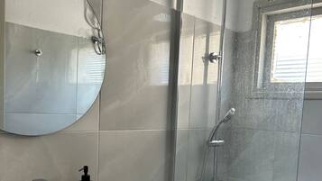 Hair dryer, towels, soap, toilet paper