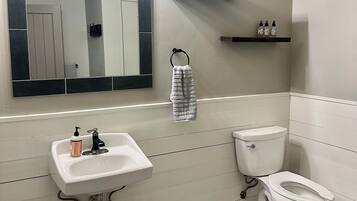 Shower, towels, soap, toilet paper