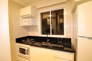 Private kitchen - Penthouse in the center of Bombinhas with a large terrace and excellent location. (Bombinhas)