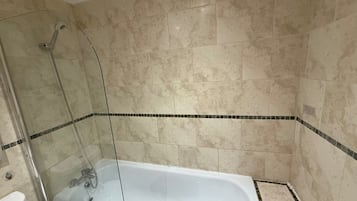 Shower, towels, toilet paper