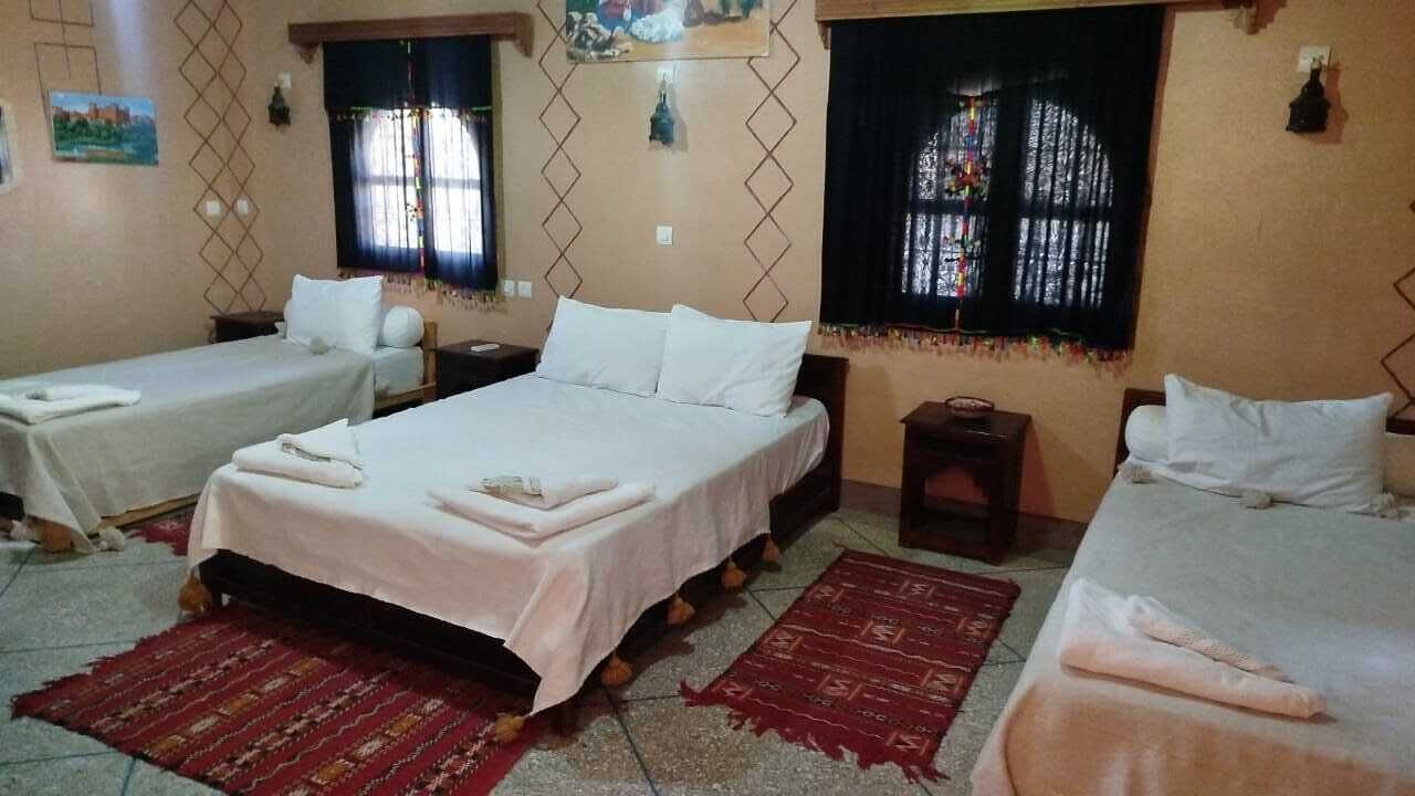 Deluxe Triple Room | Desk, laptop workspace, iron/ironing board, free WiFi