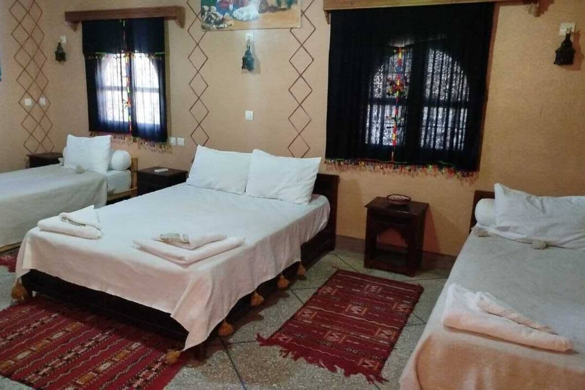 Deluxe Triple Room | Desk, laptop workspace, iron/ironing board (on request), free WiFi