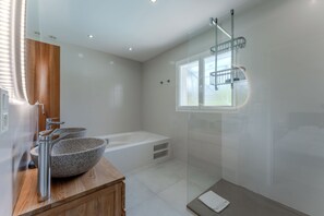 Shower, hair dryer, towels, soap