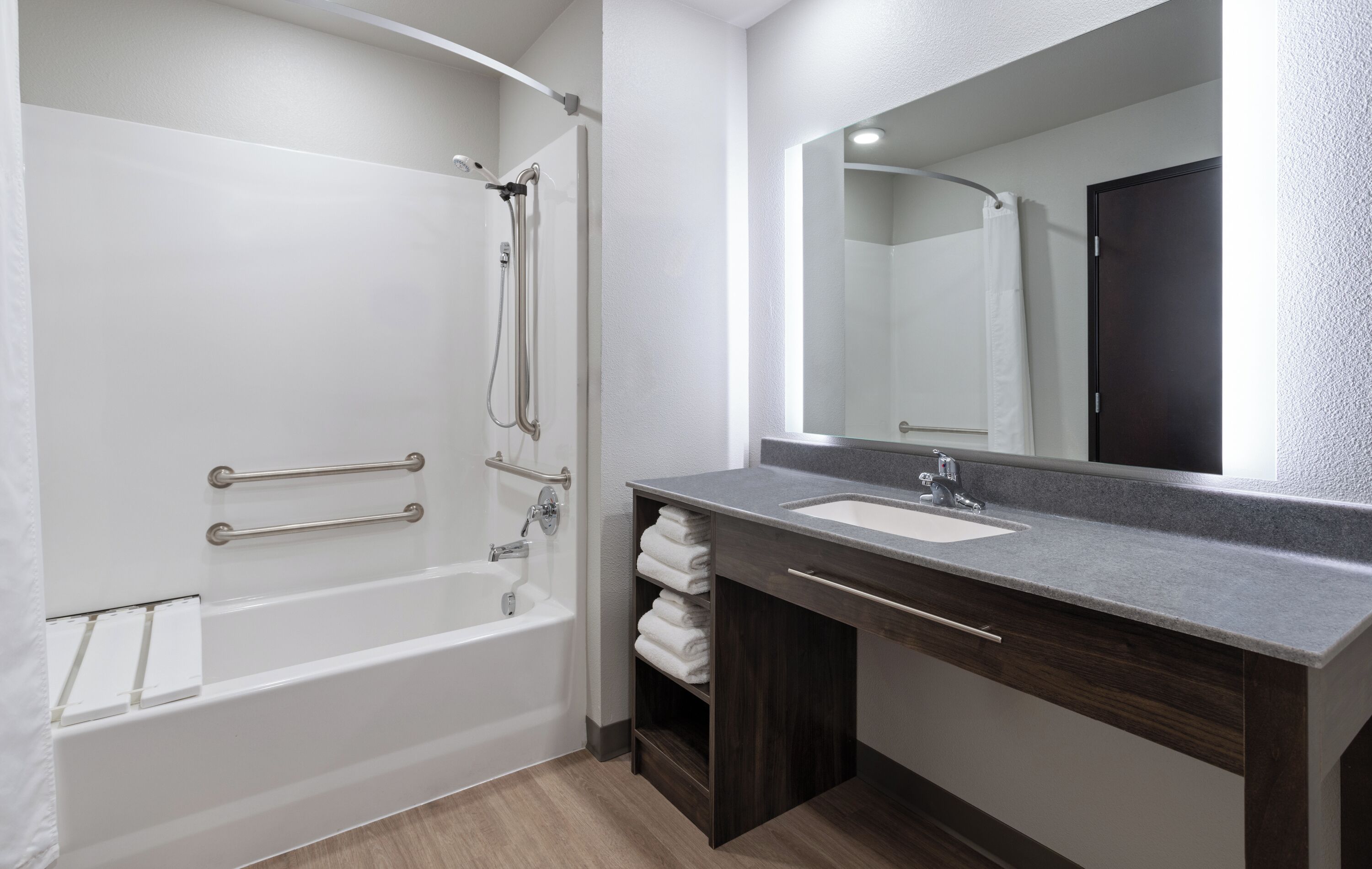 Combined shower/tub, hair dryer, towels, soap