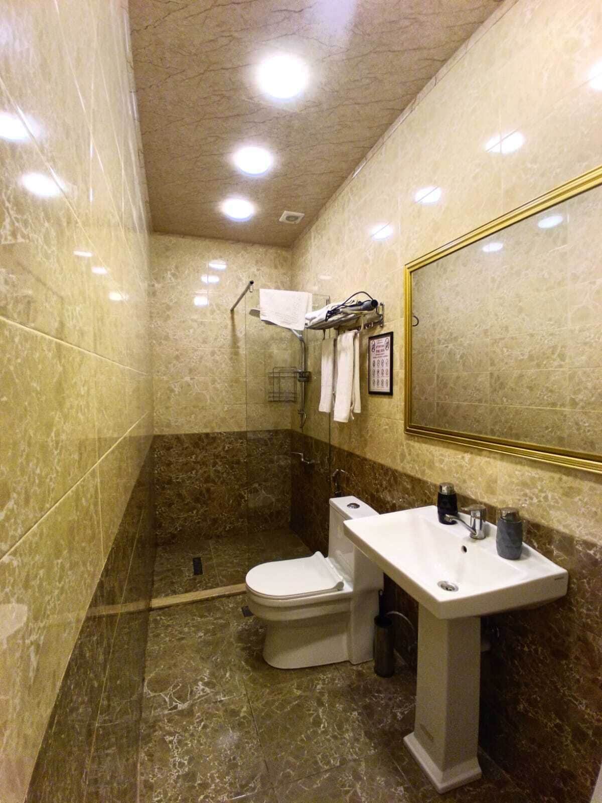 Hair dryer, slippers, towels, soap