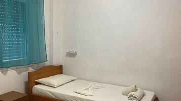 Yhden hengen standard-huone | Tallelokero huoneessa, pimennysverhot, ilmainen Wi-Fi