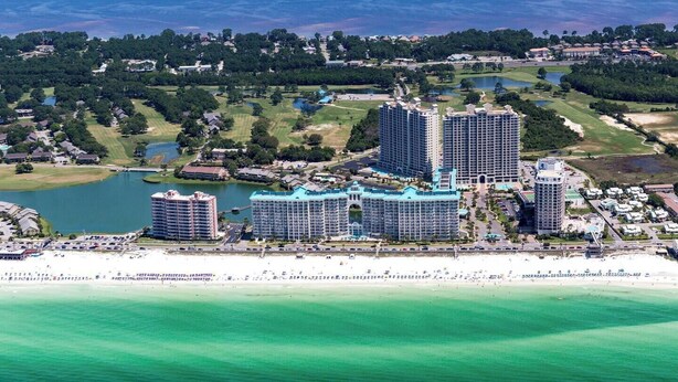 A coastal resort with multiple high-rise hotels, a beachfront, and a golf course. - 3 Bd/3Ba GULF views! Comp Beach chair set-up! (Miramar Beach)