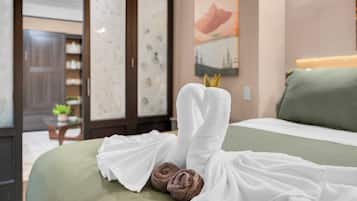 1 habitación, tabla de planchar con plancha y cuna de viaje