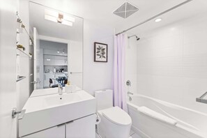 Shower, hair dryer, towels, soap - 2BR Lower East Side Family Haven Private Patio! (New York)