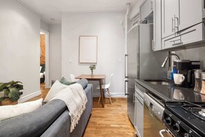 Fridge, microwave, oven, stovetop - Trendy Nolita Stay | Walk to SoHo & Little Italy (New York)