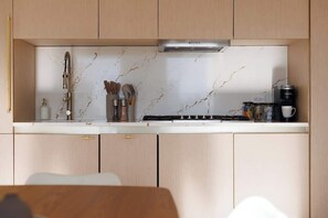 Fridge, microwave, oven, stovetop - Exclusive Midtown Luxury | Step From Times Square! (New York)