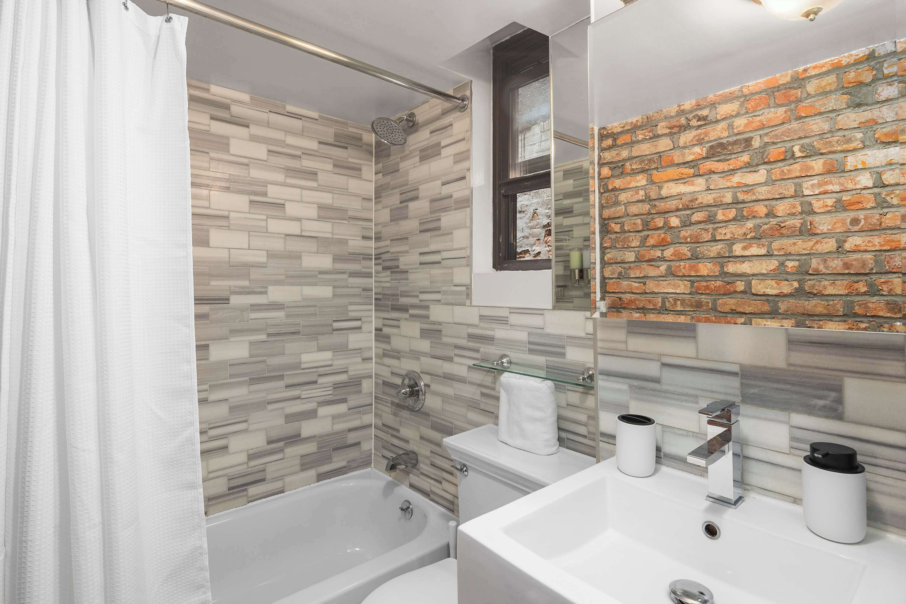 Shower, hair dryer, towels, shampoo