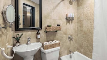 Shower, hair dryer, towels, shampoo