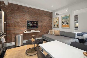 Living area - Chic 2BR Retreat in the Heart of Times Square (New York)