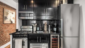 Coffee/tea maker, fridge, microwave, oven - Unique NYC Escape 1BR in East Village Patio! (New York)