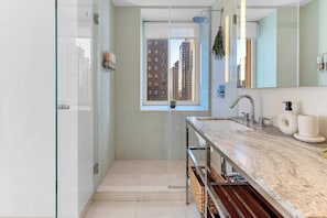 Shower, hair dryer, towels, soap