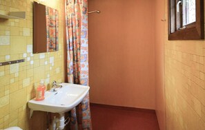 A bathroom with a sink, mirror, and shower curtain. - Amazing home in Ekshärad with WiFi (Ekshärad)