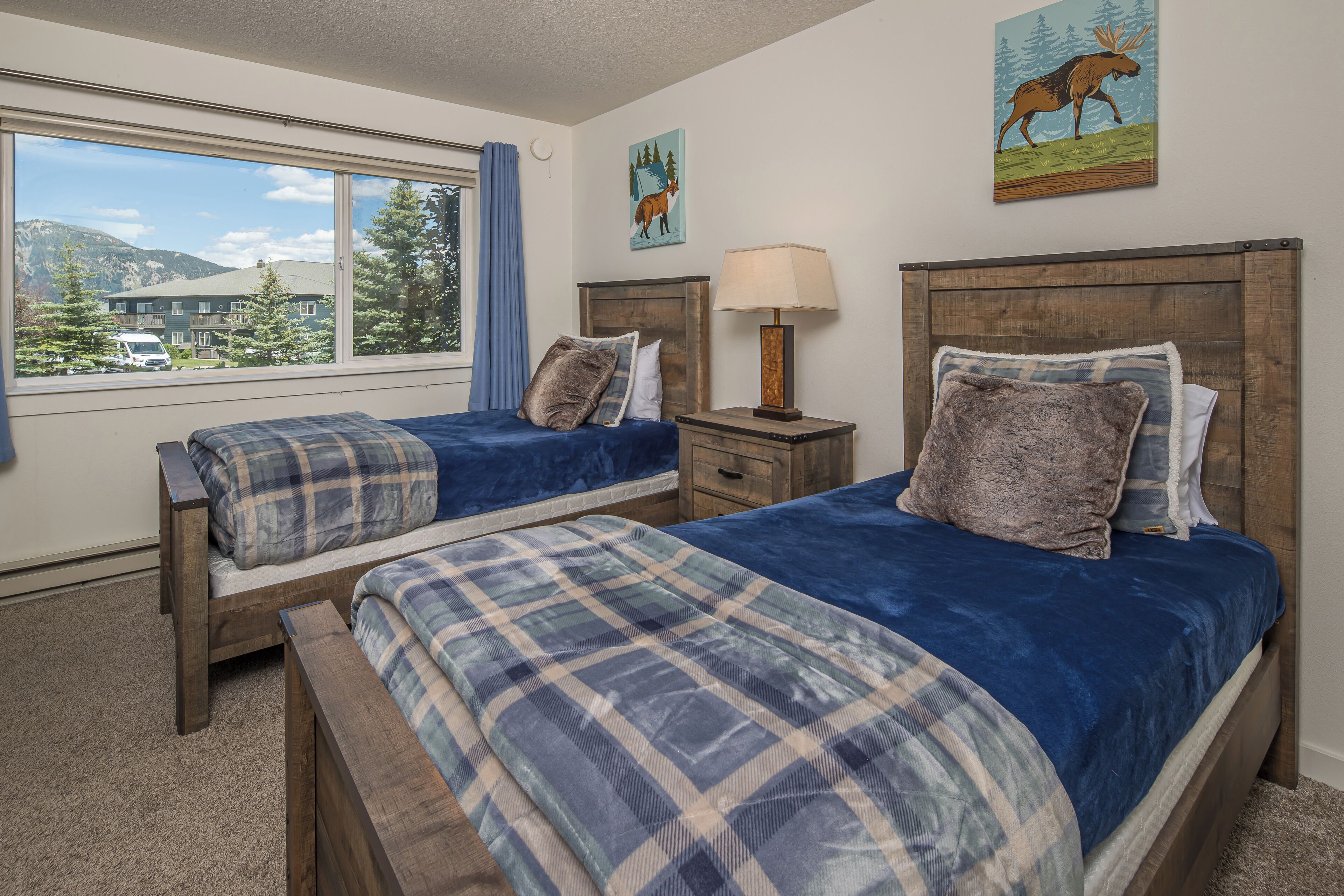 Third bedroom is perfect for the kids with these two twin beds | Upper Level
