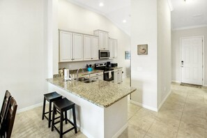 Fridge, microwave, oven, stovetop - Stunning 2nd floor condo at Esplanade Golf & Country Club - Golf Included - Wait N Sea (Bradenton)