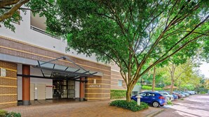 A building with a brick facade and a covered entrance labeled "ARGYLE." - Redfern 2Br Apt with balcony free parking near CBD (Redfern)