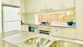 Fridge, microwave, oven, stovetop