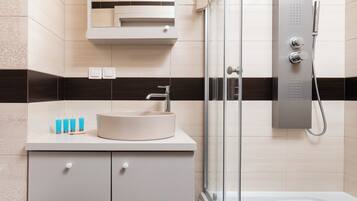 Shower, hair dryer, towels