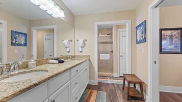 Shower, hair dryer, towels, shampoo