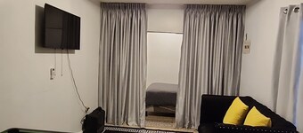 Adorable First Floor 2-bedroom Apartment & Terrace in La Ceiba